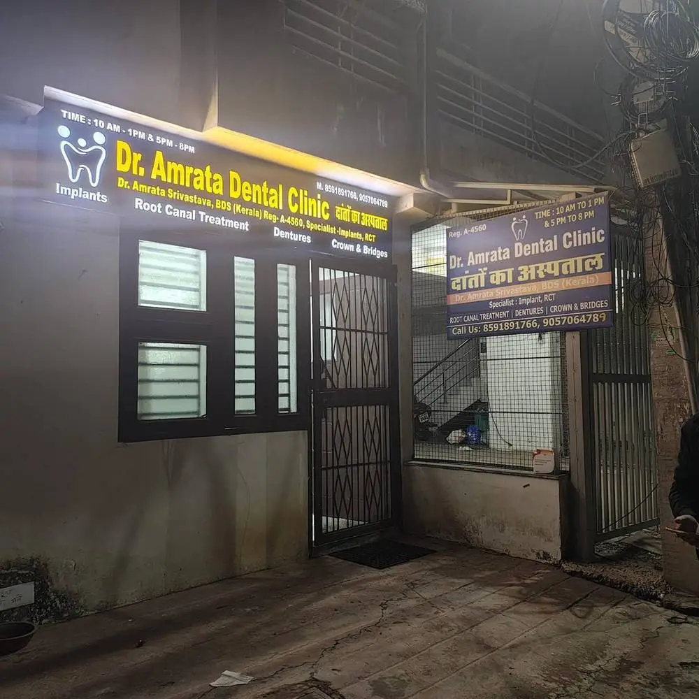 Dr. Amrata Dental Clinic exterior with signboard